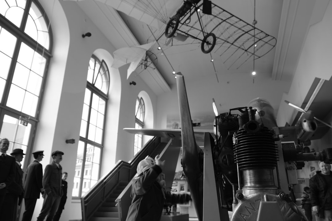 An old airplane is displayed in a museum.