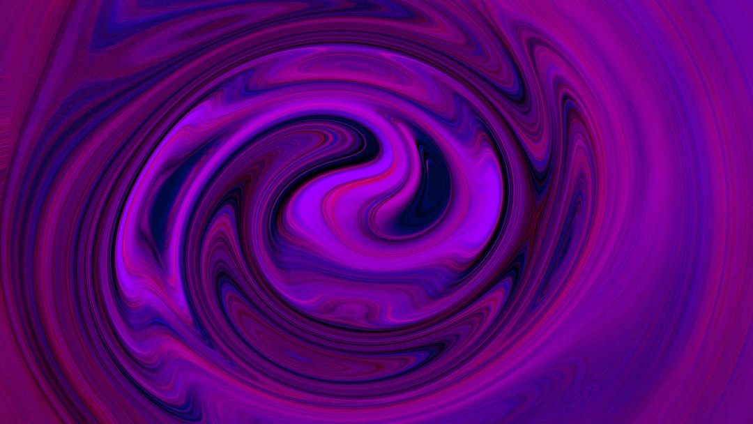 A purple swirl is shown in the middle of the image